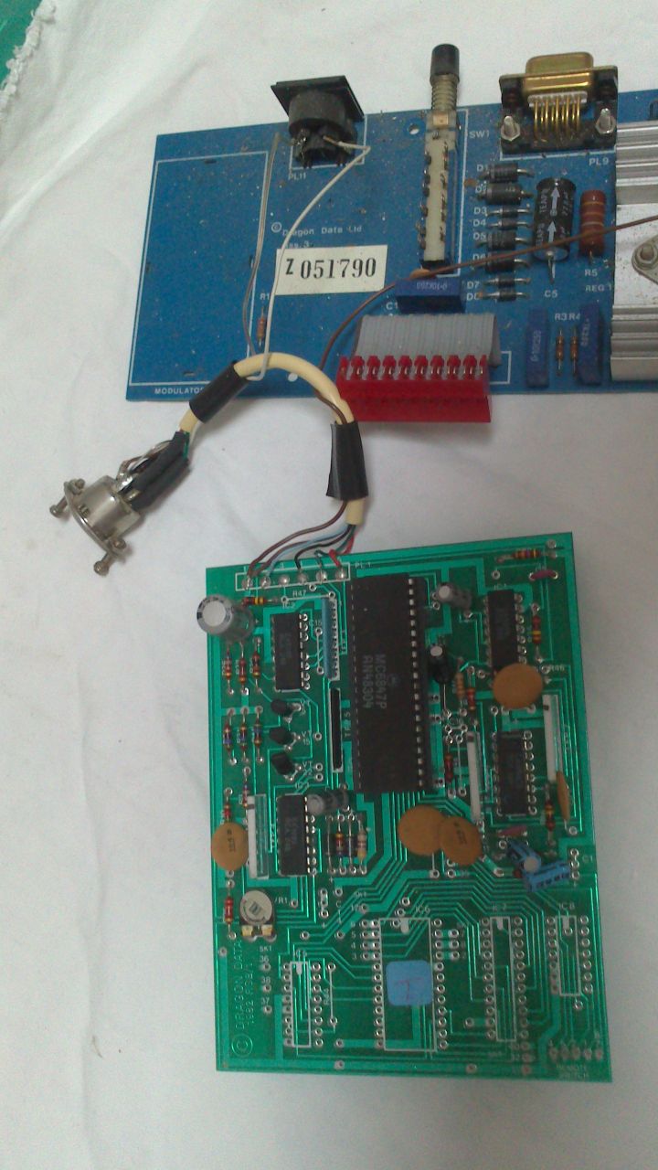 The two boards attached, before cleaning (had to unsolder the wires to this)